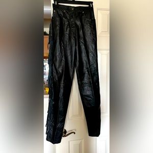 Ladies vintage leather pants with fringe on the sides. Very fun! Size XS.